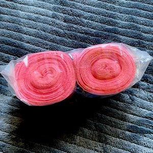 Pink hand wraps (boxing)